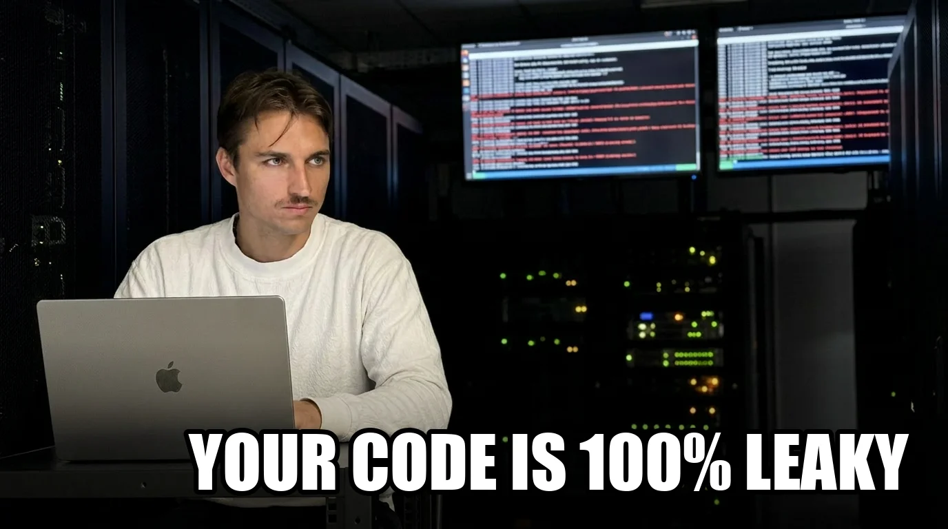 Marius at a MacBook in a dark server room with red error screens in the background